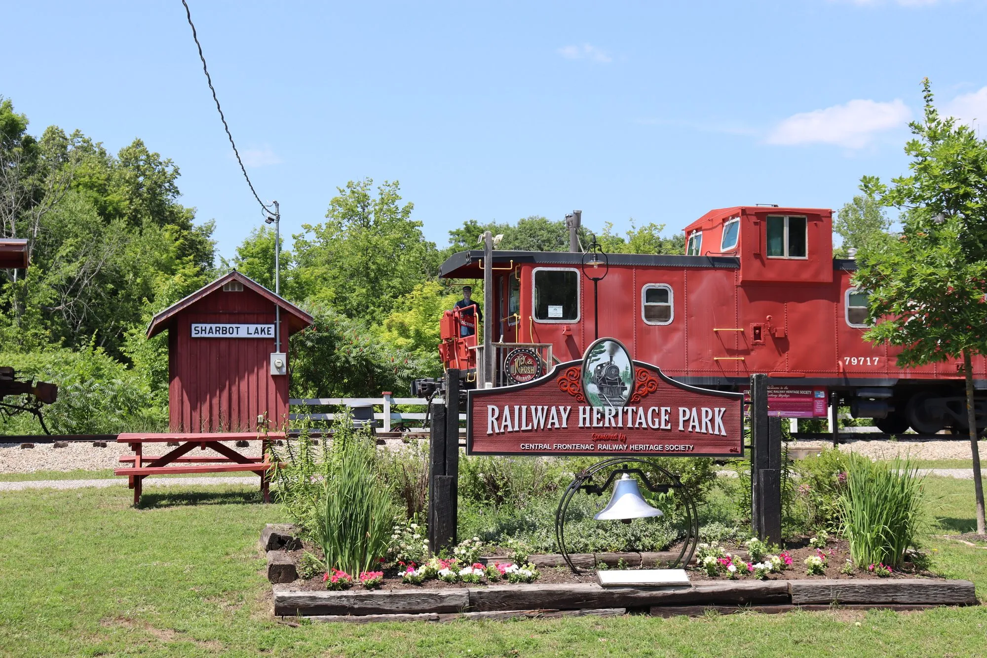 Rolling stock and picnic ground at Railway Heritage Park, Sharbot Lake